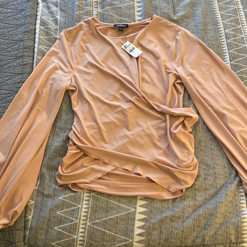 Express top. More of a blush color